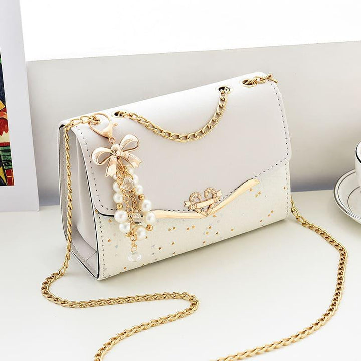 bolsa-feminina-pequena-perola-574